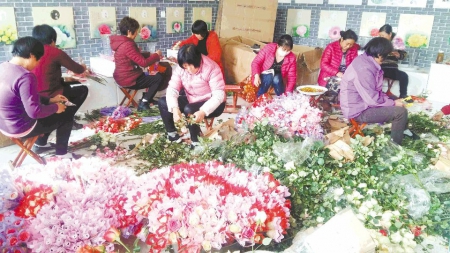 绚烂鲜花走俏“三八”市场